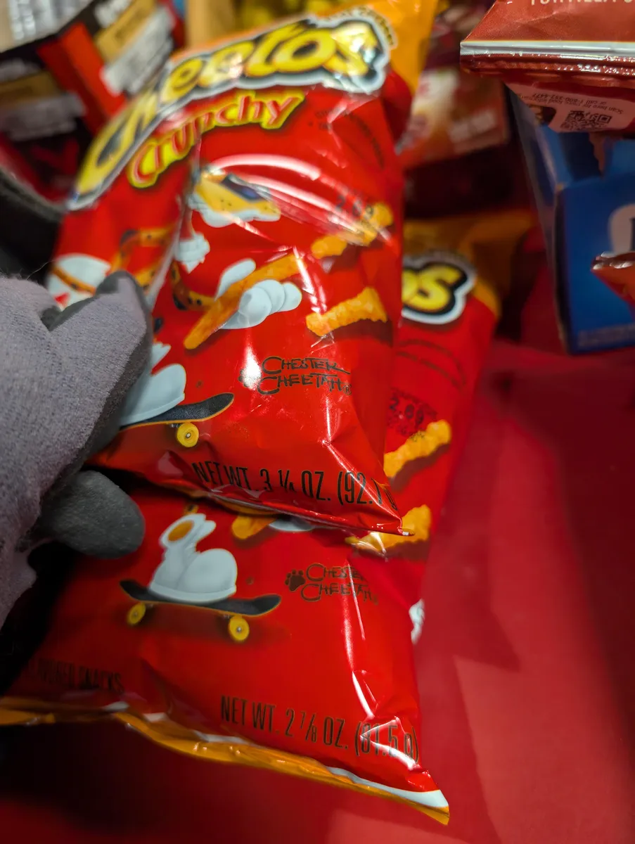 Frito-Lay Cheetos and Doritos Nacho Cheese package